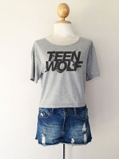 a t - shirt with the words teen wolf on it is displayed on a mannequin