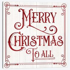 merry christmas to all sign with red lettering on white wood planks and an ornate frame