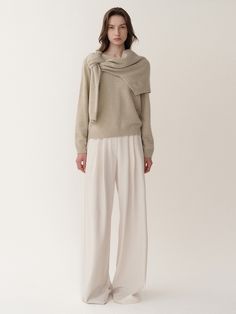 Editor's NotesWide Leg Full Pants is wide-fit pants with an elegant high-waist line with a silky texture and a wide fall on the hem.- Two tuck on both sides create a relaxed silhouette- Cream color maximizes the cosy mood= Cotton tape to the inner area of the belt and hold the waistline strong with soft textureMeasurements(in.)Size: S  M- Length: 44.4 in. / 44.8 in.- Waist: 14.5 in. / 15.3 in.- Hip: 19.6 in. / 20.4 in.- Frontrise: 14.1 in. / 14.5 in.- Thigh: 15 in. / 15.8 in.- Hem: 14.1 in. / 14 Elegant Wide Leg Pants For Winter Loungewear, Silky Texture, Fit Pants, Get Dressed, Workout Pants, Cream Color, High Waist, Wide Leg, Thing 1