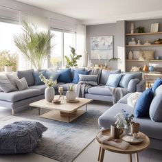 a living room filled with lots of blue furniture