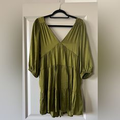 Beautiful Green Dress Never Worn Or Used. Recommend For Smaller Chest. Purchased From Local Boutique. Would Be Beautiful For Spring, Summer, Or Fall. Light, Flowy Fabric. V-neck Mini Dress In Rayon, Flowy Tunic Mini Dress For Brunch, V-neck Rayon Mini Dress, Green Rayon Mini Dress, Fitted Tunic Dresses For Brunch, Green Rayon Mini Dress For Vacation, Green Rayon Mini Dress For Day Out, Green Viscose Dress For Brunch, Chic Green Rayon Mini Dress