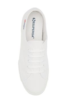 Bring tennis-inspired style to your wardrobe with this especially lightweight sneaker that boasts a cotton-canvas upper and a vulcanized-rubber sole. 1 3/4" heel; 1" platform Cushioned insole Textile upper and lining/rubber sole Imported Everyday White Canvas Sneakers, Sporty Cotton Sneakers With White Sole, White Cotton Canvas Shoes For Everyday, Everyday White Cotton Canvas Shoes, White Canvas Platform Sneakers With Vulcanized Sole, Spring Canvas Sneakers With Vulcanized Sole, Everyday Canvas Shoes With Vulcanized Sole, Spring Sporty Cotton High-top Sneakers, Cotton Sneakers For Everyday Spring Wear