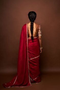 Maroon saree featuring pitta, cutdana and butti work. Paired with an embroidered sleeve blouse and a petticoat. - Aza Fashions Traditional Drape Blouse With Dori Work For Puja, Silk Pre-draped Saree With Dori Work For Puja, Bollywood Art Silk Blouse With Sheer Dupatta, Bollywood Style Art Silk Blouse With Sheer Dupatta, Fitted Pre-draped Saree With Dori Work, Fitted Pre-draped Dori Work Saree, Bollywood Style Raw Silk Blouse With Sheer Dupatta, Sheer Dupatta Dola Silk Blouse For Festivals, Dola Silk Blouse With Sheer Dupatta For Festivals