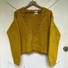 Sold Out Style From Tach Clothing. This Is Super Chunky And Warm, The Yarn Is Actually Super Soft. This Looks Great Over A Shirt Or Worn Alone As A Top. Made Of Ethically Sourced Merino Wool Yellow Fitted Casual Cardigan, Fitted Yellow Casual Cardigan, Yellow Fitted V-neck Cardigan, Mustard Fitted Sweater For Spring, Fitted Mustard Sweater For Spring, Yellow Fitted Vintage Cardigan, Fitted Vintage Yellow Cardigan, Super Chunky, Fall 2024