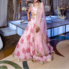 Custom Made Floral Pink Lehenga With Gold Embroidery, Perfect For Any Wedding Event, Worn Once And In Great Condition, Off The Shoulder Top Bollywood Lehenga For Marriage During Diwali, Traditional Marriage Wear With Intricate Embroidery, Festival Marriage Lehenga With Zari Work, Festive Lehenga With Zari Work For Marriage, Bollywood Style Tissue Silk Traditional Wear For Wedding, Bollywood Tissue Silk Traditional Wear For Wedding, Bollywood Style Lehenga For Marriage, Traditional Wedding Lehenga With Intricate Embroidery, Floor-length Marriage Sets With Intricate Embroidery