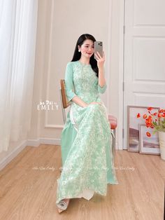 🌻This Set includes 1 long dress 🌻Material: Voan silk , double layers      Stretchy level: 1/10 🌻 The measurement of this ao dai (long dress) is in Vietnamese size (American size tends to be bigger for the same size). Please LOOK AT THE SIZE CHART CAREFULLY BEFORE ORDERING. There might have some chalk writings on the fabric due to making process. These marks can be washed away easily. 🌻🌻No returns or exchanges Buyer can contact seller about any issues with an order. 🌸 Follow us Facebook/aodaiemily www.aodaiemily.com 💜 Thank you very much!💜 Green Floor-length Sets For Spring, Green Floor-length Spring Sets, Fitted Long Sleeve Cheongsam For Summer, Elegant Green Ao Dai For Summer, Green Spring Wedding Cheongsam, Spring Wedding Green Cheongsam, Green Maxi Length Set For Spring, Green Ao Dai For Spring Wedding, Spring Wedding Green Ao Dai