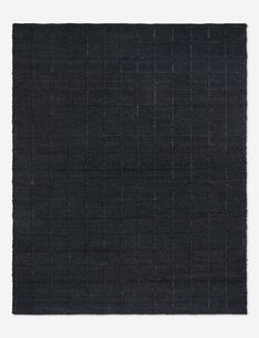 a black area rug on a white background with no one in it or someone else