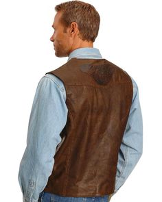 Kobler Tooled Leather Vest, Acorn Brown Leather Outerwear For Western-themed Events, Rugged Leather Vest Outerwear, Rugged Brown Vest Outerwear, Western Leather Vest For Fall, Rugged Brown Vest For Fall, Brown Sleeveless Vest For Western-themed Events, Rugged Leather Sleeveless Vest, Fitted Rugged Brown Vest, Fitted Brown Rugged Vest