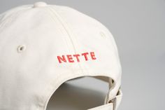 DESCRIPTION  Calling all FRAG HEADS! With a cream-on-cream colorway, embroidered declaration of fragrance fandom, and perfect dad hat fit, it’s easy to see why The Cap has been a summertime staple for us. It's crafted from lightweight 100% cotton for comfort and includes an adjustable fastener with a metal clasp and tonal under-peak lining for a perfect fit. DETAILS & CARE Low profile six panel cap, curved peak. Lightweight 100% cotton. Adjustable fastener with metal clasp. One size fits all. Cream Cotton Snapback Trucker Hat, Cream Cotton Snapback Hat, Beige Baseball Cap For Summer Streetwear, Cream Cotton Hat For Streetwear, Summer Snapback Hat With Embroidered Logo And Curved Brim, Beige Summer Hats With Embroidered Logo, Casual Cream Cotton Trucker Hat, Everyday Cream Cotton Hat, Cotton Six-panel Snapback Hat For Summer