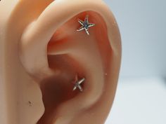 * Material : 925 sterling silver Starfish, 316L Surgical Steel Post . Starfish Size : 6.50 mm Push Pin Post - 4 mm Flat Back For: cartilage, tragus, helix or conch Bar length : 6mm / 8mm / 10mm Bar Thickness : Standard 16 gauge (1.2mm) Quantity : Single (1 piece) Sterling Silver Star Piercings In Silver, Sterling Silver Star-shaped Piercings, Silver Star-shaped Sterling Silver Piercings, Nickel-free Silver Star Piercings, Nickel Free Silver Star-shaped Piercing, Nickel-free Star-shaped Silver Piercings, Silver Star Single Stud Earring, Silver Star Shaped Internally Threaded Piercings, Silver Star Internally Threaded Piercings