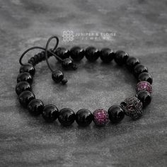 This stunning handmade bracelet is made with 8mm Black Onyx, featuring Gunmetal Jaguar charm and spacer beads embellished with fuchsia and Black Zircon Stones. It's adjustable, utilizing a sliding knot made with macrame cord and is easy to put on and take off by yourself. All bracelet models can be customized as stretch or adjustable for the same price. You may have a piece created just for you. Please send message for custom orders. I can create a bracelet as you wish and send you the photos be Jaguar Bracelet, Jaguar Cat, Top Christmas Gifts, Black Jaguar, Womens Bracelet, Womens Jewelry, Bracelet Gemstone, Sliding Knot, Macrame Cord