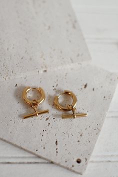 Lightweight drop earrings featuring an interlocking chain and bar. Perfect touch of edge. Lightweight, and great for every day wear. Stainless Steel, 18k gold plated tarnish free, hypoallergenic Cuffing Season, Chain Earrings, Every Day, 18k Gold, Gold Plate, Plating, Stud Earrings, Drop Earrings, Stainless Steel