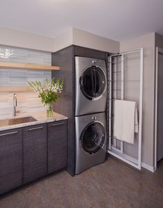 a washer and dryer in a small kitchen