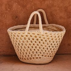 White Bohemian Open Weave Straw Bag, Eco-friendly White Open Weave Beach Bag, Handmade Crochet Basket Bag, Handmade Bohemian Straw Bag For Picnic, Bohemian Natural Basket Beach Bag, Beige Braided Basket Beach Bag, Handwoven Jute Straw Bag For Picnics, Natural Woven Basket Beach Bag, White Straw Bag For Summer Market