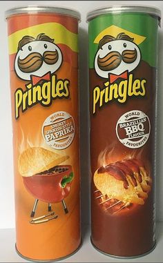 two cans of pringles sitting next to each other