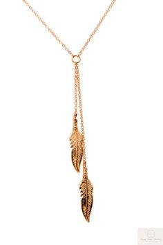 "Our Double-sided Feather Necklace has a dainty elegance and lays flat, the two feathers are independent of one another secured with a cable chain. This Statement necklace is available in both 14k Rose gold, White gold, yellow gold or in sterling silver, and excellent anniversary gift for her, some called it leaf necklace, charm necklace. You have a choice in necklace length 15\" through 18\" and is secured with a matching lobster clasp, the Lariat is an additional 1.5\" for the first feather an Two Feathers, Feather Necklace, Gold Feathers, Y Necklace, Rose Gold White, Feather Pendant, Feather Necklaces, Necklace Charm, Leaf Necklace