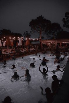 many people are in the pool at night