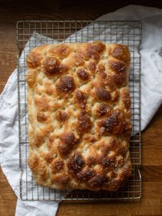 a piece of bread sitting on top of a cooling rack