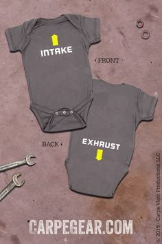 two baby onesuits with the words make and exhaustt on them