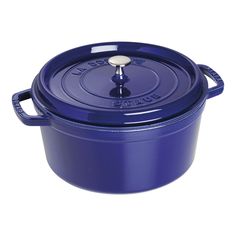 a blue casserole dish with a lid and handle on the bottom, sitting in front of a white background