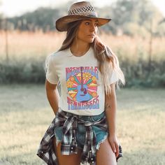 Get ready to be OBSESSED with your new 'Nashville Tennessee' Guitar, Sunflower t-shirt. It's the cutest and most trendy way to emit all those important country music vibes! This is the perfect tshirt for boho cowgirls, Nashville girls trips, country concerts, rodeo events, or music festivals and makes a great gift for country/western clothing and fashion lovers! Please note: We have intentionally added a grain effect to your tshirt, to give it a more rustic/retro look. Have a look around my shop Music Festival Tshirts, Retro T-shirt For Summer Country Concerts, Fun Short Sleeve T-shirt For Music Festival, Graphic Tee Shirt For Summer Music Festival, Summer Graphic Tee Shirt For Music Festival, Summer Graphic Tee For Music Festival, Summer Music-themed Shirt With Screen Print, Unisex Tops For Summer Music Festival, Summer Fan Merchandise Tops