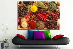 a living room scene with focus on the colorful spices and herbs displayed on the wall