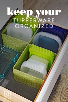 an open drawer filled with assorted plastic containers