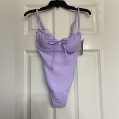 Nwt Wild Fable Lavender 1pc Swimsuit Size Xs (0-2) Purple Bodysuit For Poolside During Beach Season, Lavender One-piece Swimwear For Beach, Lavender One-piece Swimwear For Summer, Purple One-piece Spring Swimwear, Purple One-piece Swimwear For Spring, Purple Beachwear Bodysuit For Poolside, Purple Bodysuit For Poolside And Beach Season, Purple Lined Bodysuit For Pool, Purple One-piece Beachwear Bodysuit