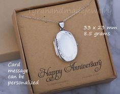 "Carrying the pictures of your loved ones close to your heart all the time, this large personalized locket necklace features: 1. a large (33 x 23 mm without bale) oval solid sterling silver locket (8.5 grams) that can be engraved on the front and back (use pulldown menu to select). Its front has an etched decorative bordered pattern while its back is plain. complex graphics (such as fingerprint) that takes long engraving time incurs a $10 surcharge. It can hold two pictures inside. Photo inserti Elegant Locket Necklace For Anniversary With Hallmark, Personalized Silver Locket Necklace For Anniversary, Elegant Personalized Locket Necklace For Anniversary, Anniversary Medallion Locket Necklace With Hallmark, Sterling Silver Locket Necklace For Anniversary On Mother's Day, Sterling Silver Locket Necklace For Mother's Day Anniversary, Silver Oval Necklace For Anniversary Gift, Silver Oval Necklace For Anniversary, Classic Personalized Locket Necklace For Anniversary