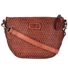 This stylish and handy sling bag from Kompanero is a great addition to your wardrobe this season. Team it with a midi dress to look chic. Handcrafted Genuine Leather Adjustable Shoulder Strap 1 inside pocket and 1 inside zip pocket Cotton Lining Inside Dimension: L 9 X W 3.5 X H 6.3 Inches Cognac Woven Leather Bag, Brown Crossbody Shoulder Strap With Adjustable Handle, Artisan Brown Vegetable-tanned Shoulder Bag, Tan Crossbody Bag With Silver-tone Hardware, Basket-shaped Rattan Shoulder Bag With Woven Leather, Brown Crossbody Bag With Silver-tone Hardware, Leather Sling Bag, Cannon Beach, Perfect Gift For Her