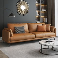 a living room with a couch, coffee table and bookshelf on the wall