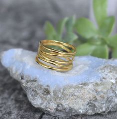 "Gold Spiral Ring -.18k gold plated over sterling silver - 10mm width/height -Versatile and Comfortable, works great as a thumb ring! - Available in US sizes 5-12 Find all rings here: https://www.etsy.com/shop/AWildViolet?section_id=13958646&ref=shopsection_leftnav_3 💜Check out our new \"Ready to Ship\" section for gifts that ship in 1 business day. https://www.etsy.com/shop/AWildViolet?ref=seller-platform-mcnav§ion_id=23587515 Connect with us on Instagram @a_wild_violet for sales and giveaways Gold Stackable Bypass Ring As A Gift, Modern Gold Toe Ring, Modern Twist Spiral Stackable Rings As Gift, Dainty Gold Bypass Ring As Gift, Modern Twist Gold Stackable Rings As Gift, Gold Bypass Ring With Modern Twist For Gift, Gold Stackable Rings As Gift With Modern Twist, Modern Twist Gold Bypass Ring As Gift, Gold Spiral Bypass Ring As Gift