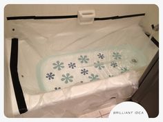 an empty bathtub is wrapped in plastic