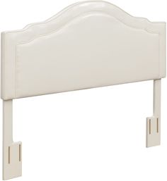 a white headboard with an arched design on the top and two small posts at the bottom