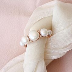 Beautiful Pearl & Diamond Ring - Lia.Product detail:♥ Five (5) pearls.♥ Side stones: natural diamonds 0.12 carat , F color, VS clarity. ♥ Material: 14K or 18k, yellow / white /rose solid gold.♥ Sizes available: 3 -9 . (bigger or smaller sizes are available, ring in photos size 6.5). ♥ In addition you can request IGL Jewelry certificate when ordering. Please select your wanted rings size, gold color and purity in drop down menu. --- Silly Shiny Service.♥ Each piece is specially and passionate Luxury Pearl White Anniversary Rings, Luxury Pearl White Wedding Rings, Rose Gold Aaa Quality Jewelry For Wedding, Rose Gold Aaa Quality Wedding Jewelry, Aaa Quality Round Diamond Ring For Wedding, Diamond White Aaa Quality Jewelry For Wedding, Aaa Quality Round Diamond Wedding Ring, Aaa Quality Diamond Wedding Ring, White Luxury Halo Jewelry