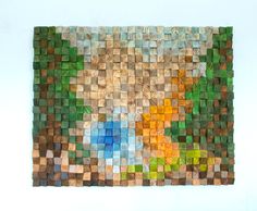 a piece of wood that has been made into a mosaic pattern with different colors and shapes