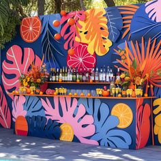 an outdoor bar decorated with bright colors and flowers