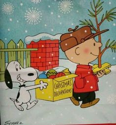 a charlie brown christmas card with a dog and a person holding a box in the snow