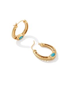 Meet every cowgirl’s dream hoop earring: the Noble Vintage Gold Horseshoe Hoop Earrings in Variegated Dark Teal Magnesite. Crafted in a horseshoe shape, these earrings feature a petite stone detail for an eye-catching pop of color. These earrings are a part of Yellow Rose by Kendra Scott—a brand that celebrates ranch life with Kendra Scott staples alongside select curated jewelry pieces and accessories. Metal Vintage 23k Yellow Gold Over Brass Closure Ear Post Size 1.2"L X 0.2"WDue to the one-of Western Gold Earrings, Western Hoop Earrings, Gold Western Jewellery, Gold And Turquoise Jewelry, Horseshoe Earring, Cowgirl Earrings