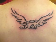 the back of a man's chest with a tattoo design on it that says dad