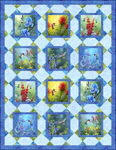 a blue quilt with flowers and birds on the border is featured in this image,