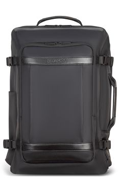 a black suitcase with straps on it