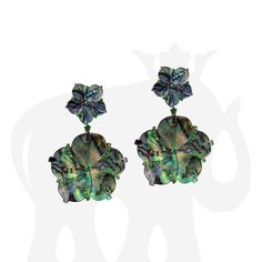 JE0427 'Innate' Mother of Pearl Flower Earrings with Tsavorite in 18K Yellow Gold and Black Rhodium Approx Wt: 31.55 Carats (Mother of Pearl), 0.78 Carats (Tsavorite) Luxury Gemstone Flower-shaped Earrings, Luxury Green Pierced Earrings, Luxury Green Gemstone Earrings, Green Luxury Pierced Earrings, Luxury Green Multi-stone Earrings, Green Luxury Earrings, Luxury Green Clip-on Jewelry, Formal Tsavorite Earrings Fine Jewelry, Formal Green Jewelry With High Luster