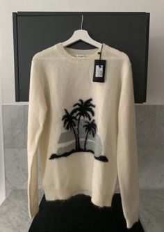 Saint Laurent Paris Palm tree intarsia mohair sweater knitted jumper cream white size xl CONDITION: _Brand new with tags _Always 100% authentic  PAYMENT: _I accept Paypal only. SHIPPING:  _ Package will be neatly shipped with outer box _ Shipping with delivery confirmation _ Item will be shipped within 48 hrs after payment is received. FREE shipping within the U.S continent  IG-kawsn3ff3ct Mohair Sweater Knit, International Model, F1 Driver, Saint Laurent Paris, Mohair Sweater, Knitted Jumper, Yachts, Cream White, Palm Tree