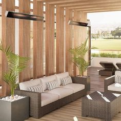 a living room filled with lots of furniture next to a wooden wall covered in wood slats