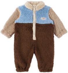 Sherpa fleece jumpsuit. · Stand collar · Press-stud closure · Textile logo patch at front · Machine-wash Supplier color: Chocolate/Gray TINYCOTTONS Size: child's height 3M: 24.5 / 62 cm 6M: 27 / 68 cm 9M: 29 / 74 cm 12M: 31.5 / 80 cm 18M: 34 / 86 cm 24M: 36 / 92 cm Chocolate Gray, Fleece Jumpsuit, Jumpsuit And Blazer, Textile Logo, Color Chocolate, Tiny Cottons, Home Products, Sherpa Fleece, Kids Clothing