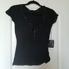 Knit Top With Second Layer/ Lining. Size Medium On Tag But Runs Small In My Opinion Black Pointelle Knit V-neck Top, Elegant Black Open Knit Tops, Elegant Fitted Textured Crochet Top, Black Pointelle Knit Top, Black Casual Crochet Top With Short Sleeves, Black Short Sleeve Crochet Top For Spring, Black Short Sleeve Knit Top, Black Fitted Open Knit Top, Fitted Black Textured Knit Top