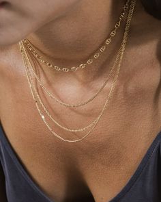 Behold fashion royalty: the Lulu Layered Necklace! Featuring a statement mix of chains, this bad boy will rock every neckline like a king or queen. So if you want to be bold and get noticed, Lulu's the one! Materials: 14K gold or rhodium plated brass Features: Measures 14-19" with 2" extender, 0.35" width, Lead & Nickel free, lobster clasp Trendy Multi-strand Charm Necklaces, Edgy Double Chain Link Necklace, Edgy Everyday Chain Jewelry, Edgy Necklace With Adjustable Chain Link, Trendy Double Chain Choker Necklace, Double Chain Link Necklace For Parties, Edgy Gold Necklace For Gifts, Edgy Gold Necklace For Gift, Stylish Chain Link Necklace With Adjustable Chain