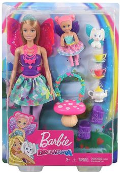 the barbie doll is in its box and has many accessories for her to play with