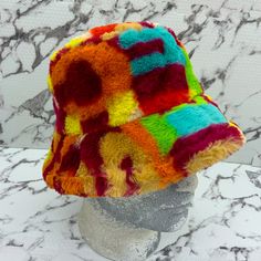 Brand New Without Tags 100% Polyester, Acrylic, Fur. Trendy Multicolor Winter Hats, Playful Yellow Winter Hat, Retro Brimmed Winter Bucket Hat, Retro Brimmed Bucket Hat For Winter, Winter Retro Brimmed Bucket Hat, Adjustable Multicolor Winter Bucket Hat, Adjustable Multicolor Bucket Hat For Winter, Multicolor Winter Bucket Hat, Trendy Yellow One-size Hat